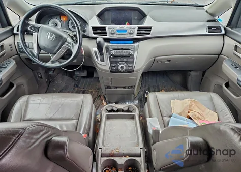 2012 Honda Odyssey Touring z USA, uszkodzony, nr VIN 5FNRL5H91CB030659